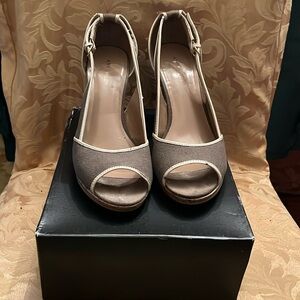 And Taylor wedges one once beige and taupe color small (dry rot)